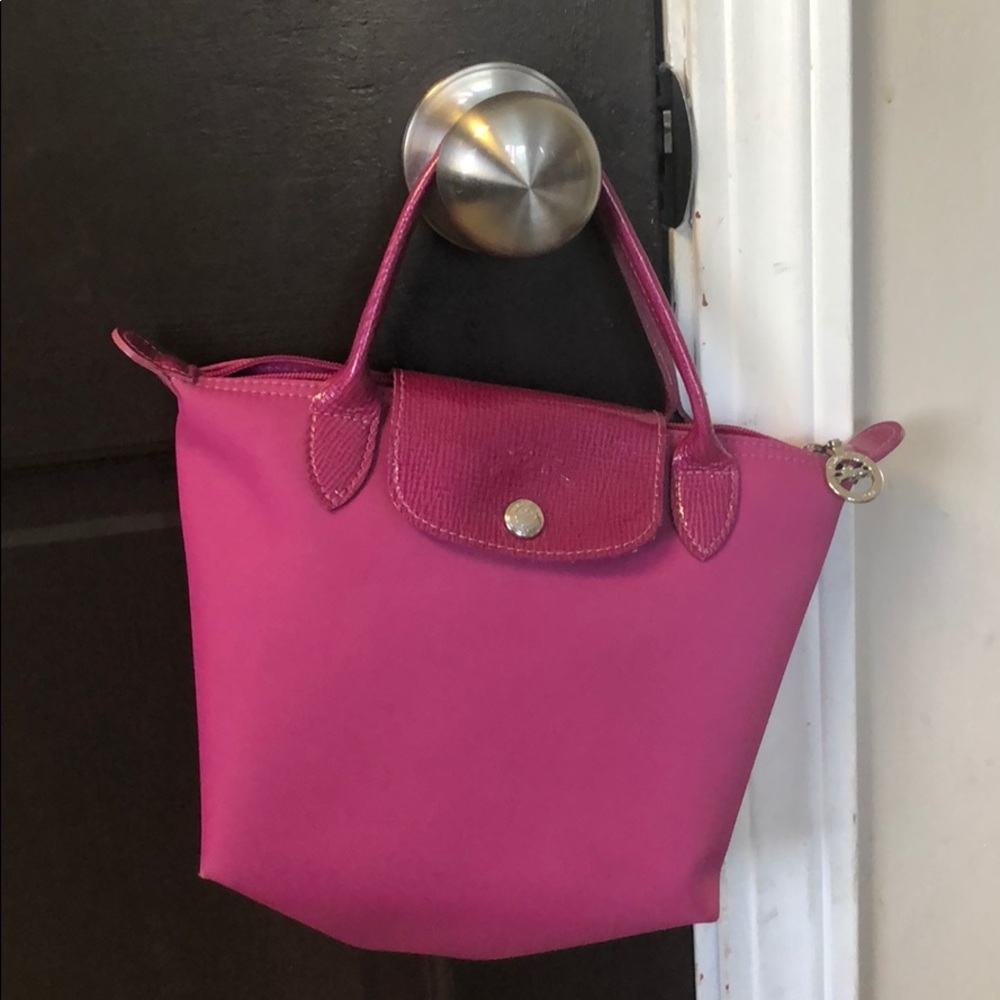 Fuchsia Longchamps  handbag! It is 9in wide x  8in